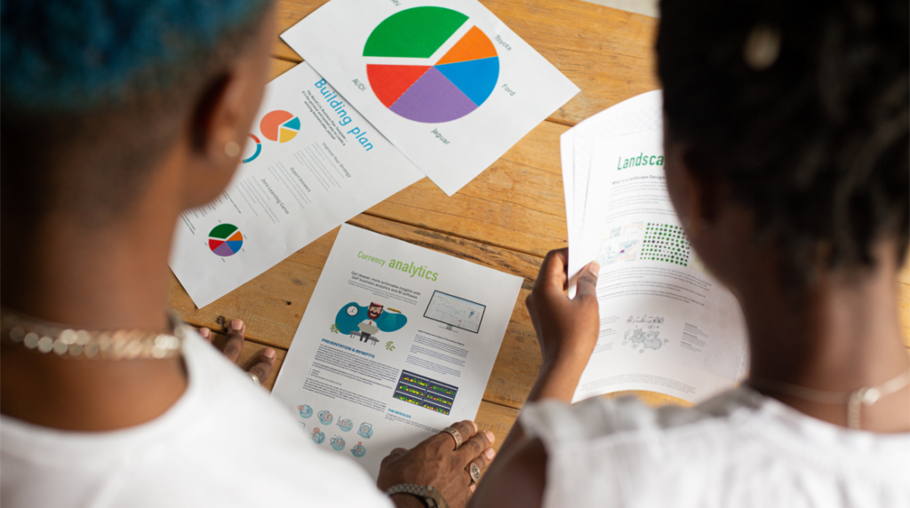 Two people working together at a workplace demonstrating emotional intelligence